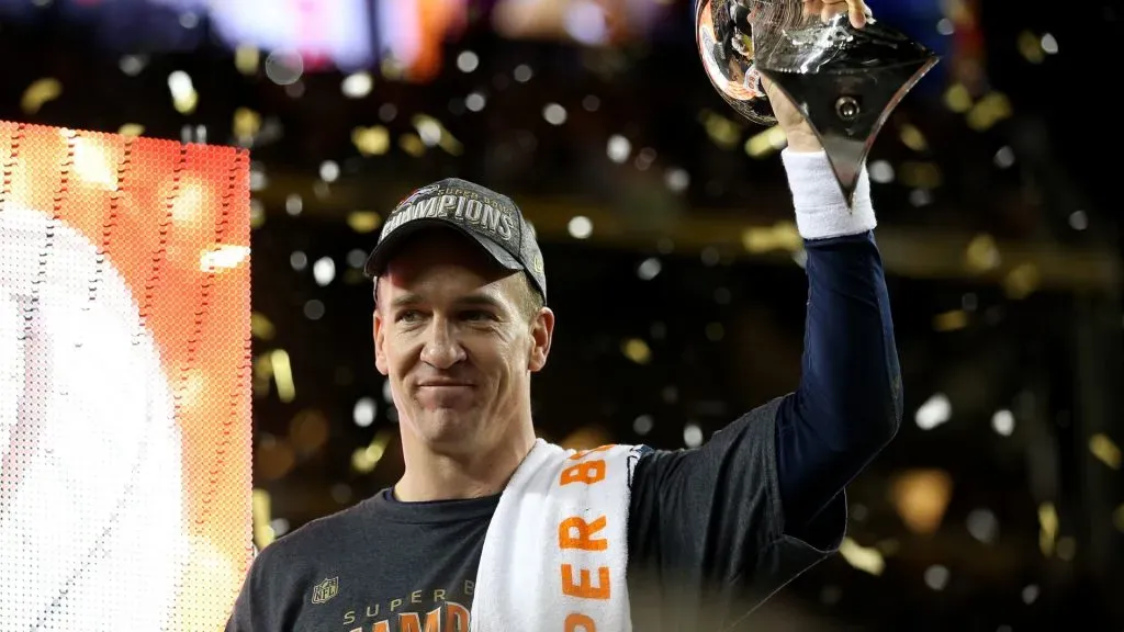 Peyton Manning celebrates with the Vince Lombardi Trophy after Super Bowl 50.