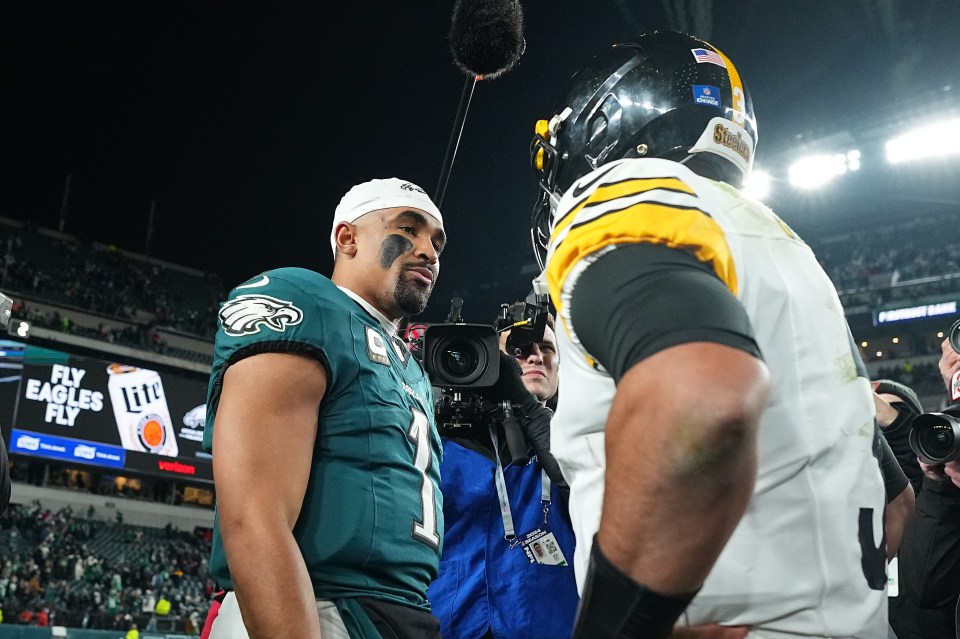 Philadelphia Eagles' Jalen Hurts speaks with Pittsburgh Steelers' Russell Wilson after the game at Lincoln Financial Field on Sunday