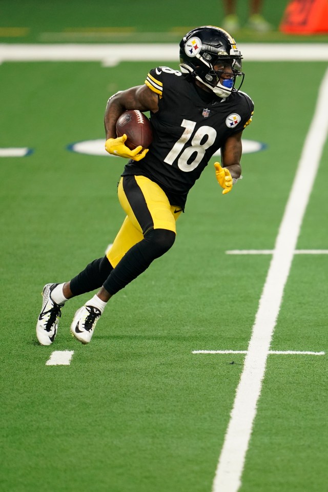 Pittsburgh Steelers player Diontae Johnson #18 running with the football.