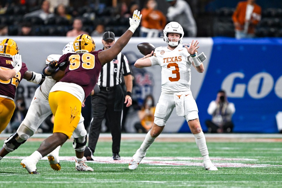 Texas quarterback Quinn Ewers throws a pass against Arizona State during the Peach Bowl