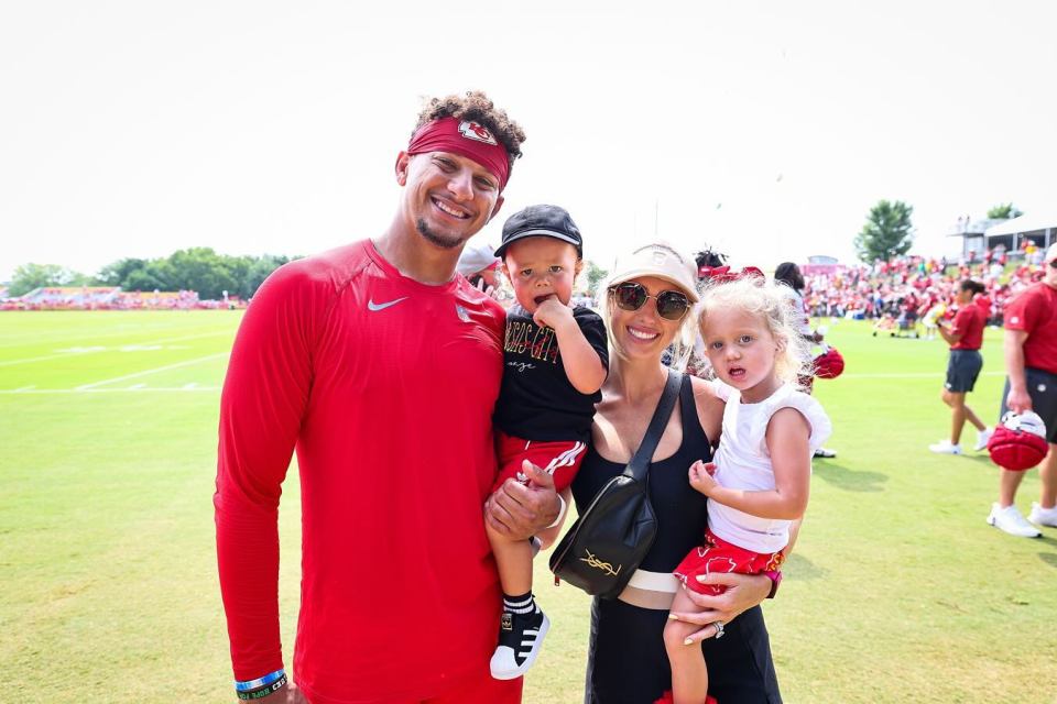 Patrick and Brittany Mahomes with their two children at Kansas City Chiefs training camp.