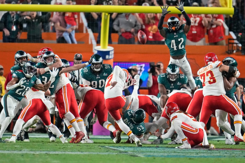 Kansas City Chiefs kicker kicking the game-winning field goal during Super Bowl 57.