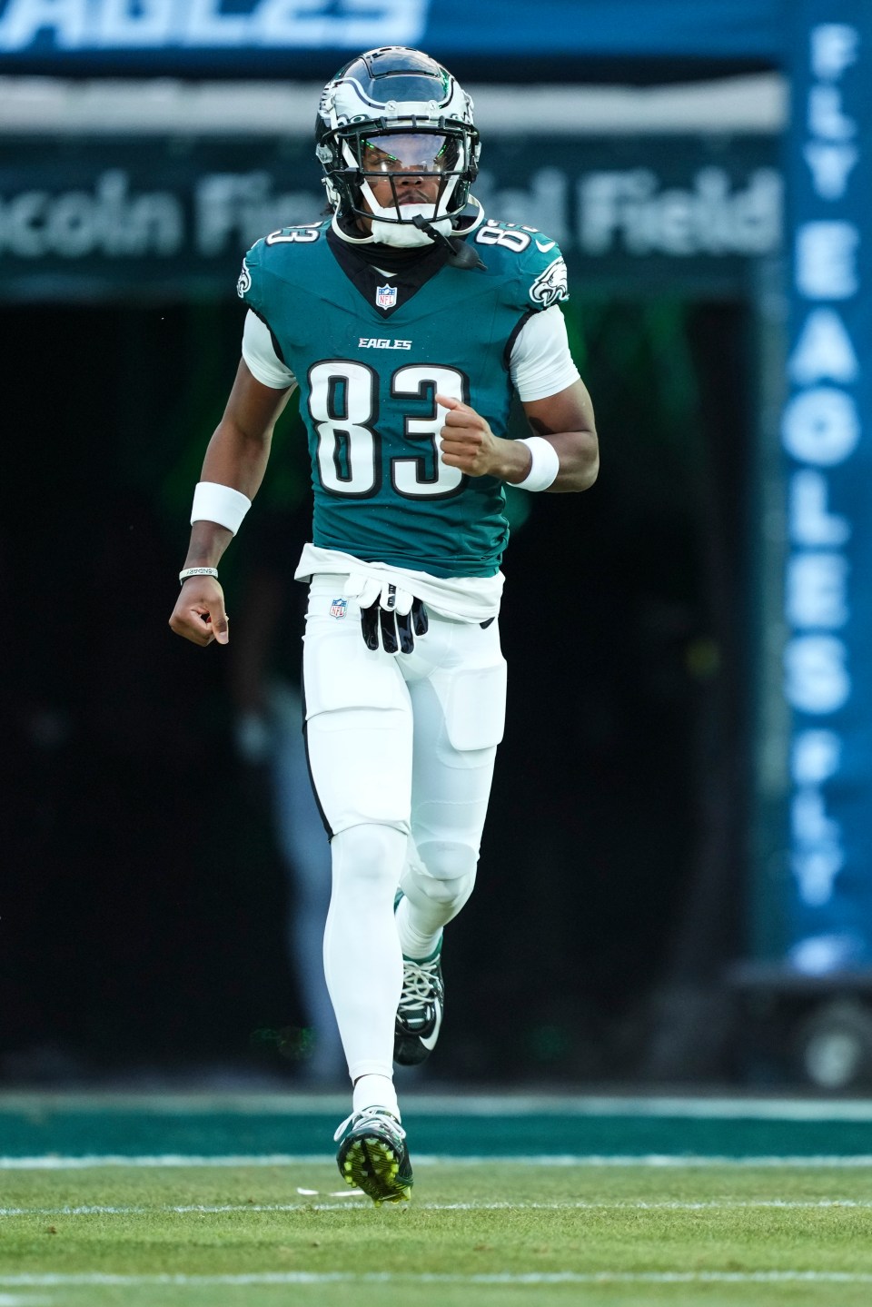 Jahan Dotson #83 of the Philadelphia Eagles running onto the field.