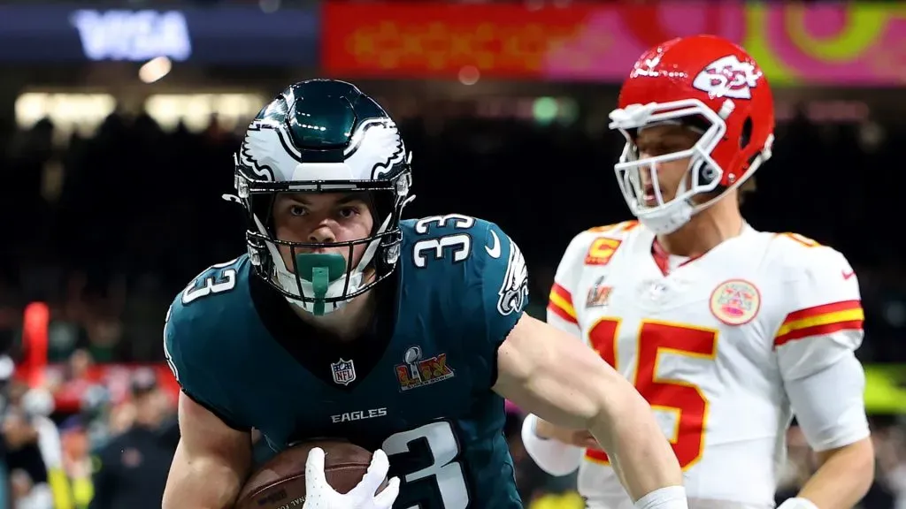 Cooper DeJean #33 of the Philadelphia Eagles scores a touchdown past Patrick Mahomes #15 of the Kansas City Chiefs after making an interception in the second quarter during Super Bowl LIX at Caesars Superdome on February 09, 2025 in New Orleans, Louisiana.