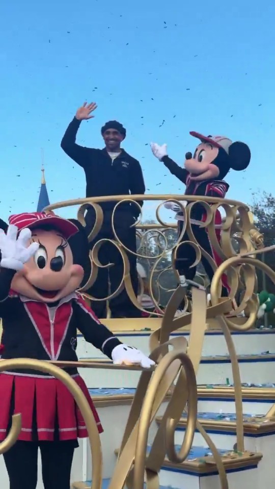 Jalen Hurts with Mickey and Minnie Mouse at Disney World.