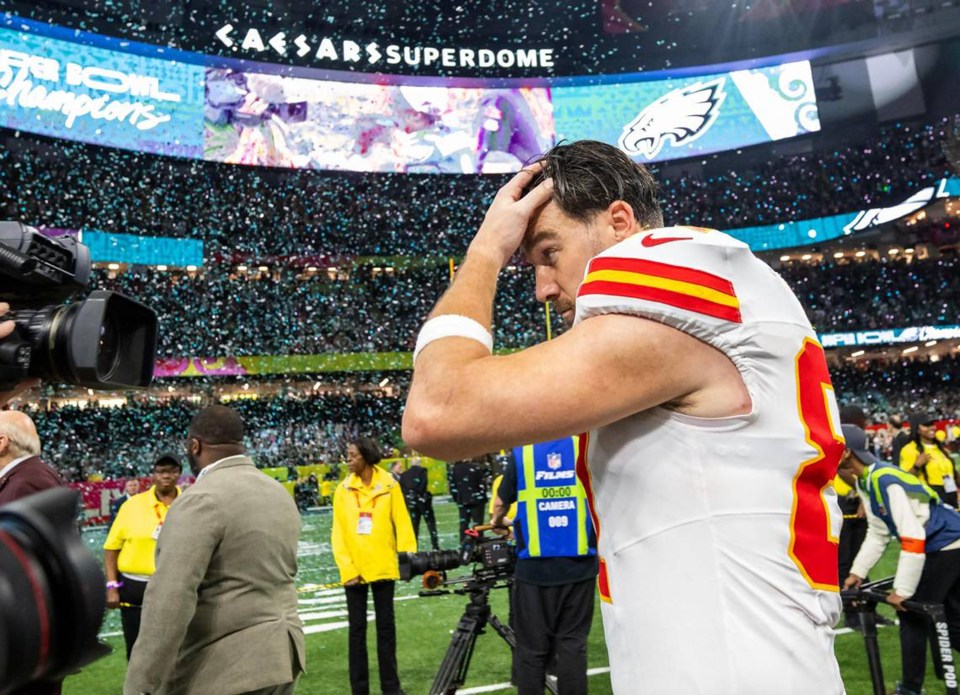 Travis Kelce of the Kansas City Chiefs walks off the field after losing Super Bowl LIX.